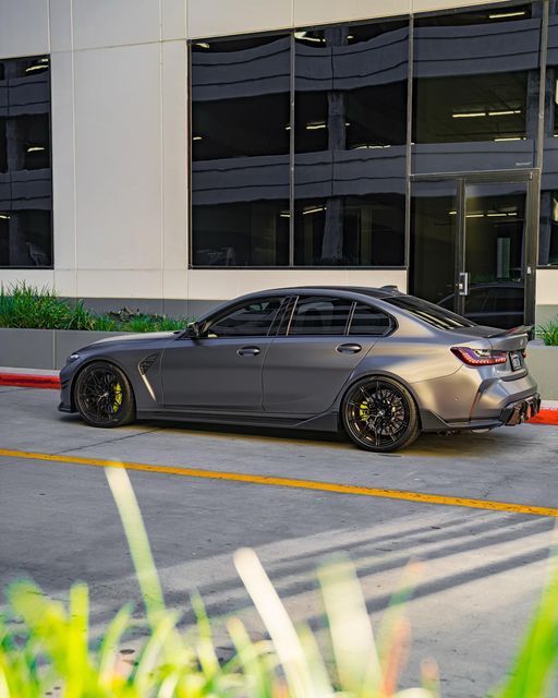 Matte grey BMW with tinted windows